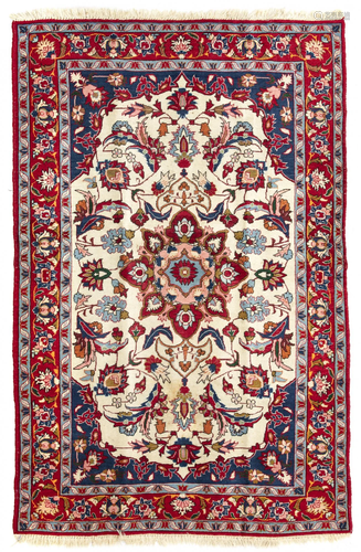 AN ISFAHAN RUG, 1930