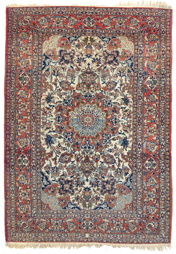 AN ISFAHAN RUG, 1920