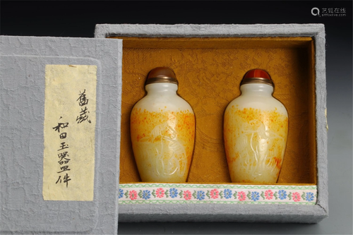 PAIR OF CARVED JADE SNUFF BOTTLES