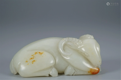 A WHITE JADE CARVING OF GOAT