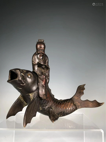 A BRONZE 'IMMORTAL ON CARP' TABLE INCENSE BURNER