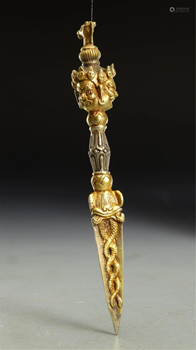 A BRONZE GILT VAJRA PESTLE