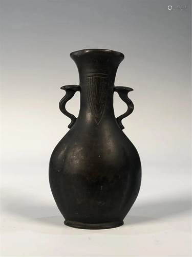 A BRONZE VASE WITH DOUBLE HANDLES