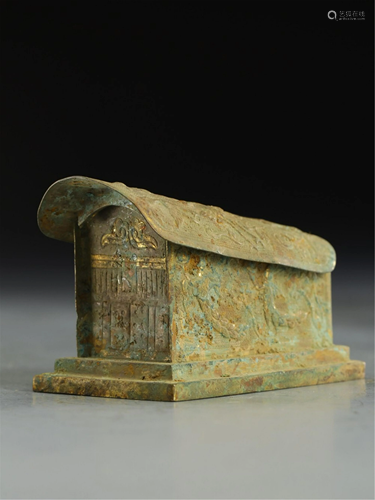 A GILT BRONZE COFFIN SHAPED DECORATION CARVED WITH