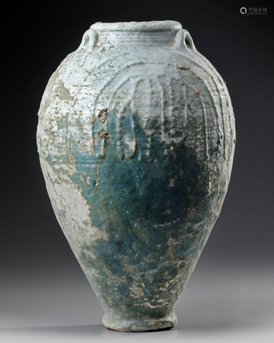 A POST SASSANIAN TURQUOISE GLAZED POTTERY STOR…