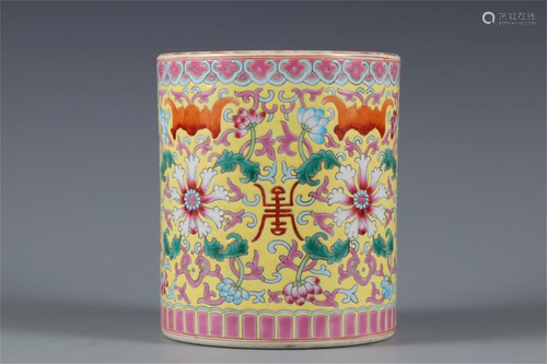 A YELLOW GROUND FAMILLE ROSE BRUSH POT