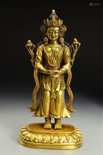 A BRONZE GILT STANDING AVALOKITESVARA