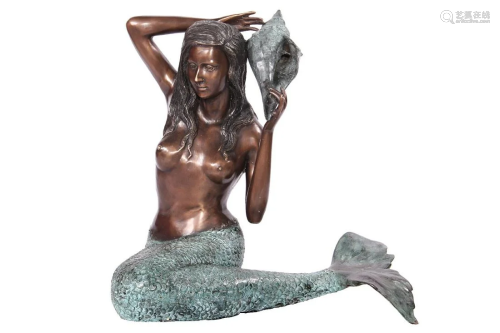 Sitting mermaid as a fountain figure