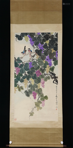 A CHINESE PAINTING OF BIRDS AND GRAPES