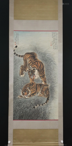 A CHINESE PAINTING OF TWO TIGERS IN GRASS-CLUSTER