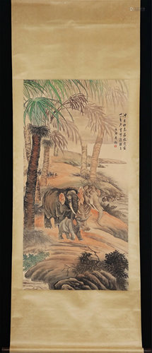 A CHINESE PAINTING OF ELEPHANTS IN THE FOREST