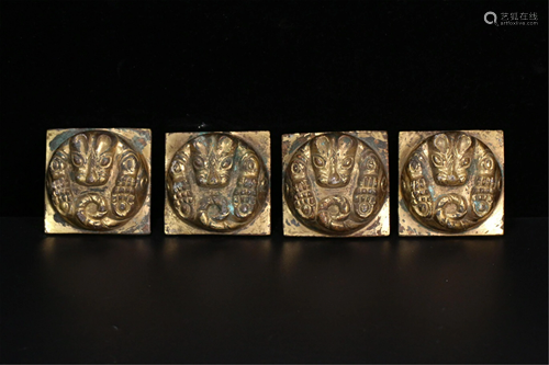 A SET OF GILDING TIGER SHAPED MAT-WEIGHTS