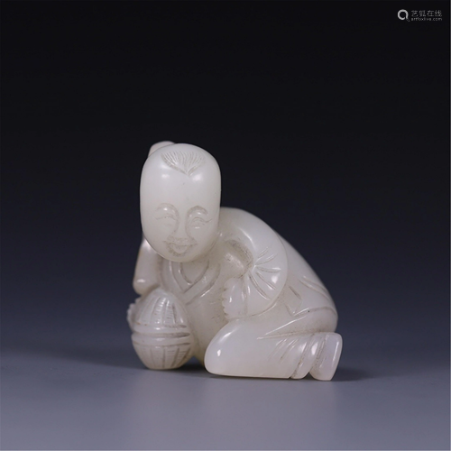 A JADE CARVED CHILD