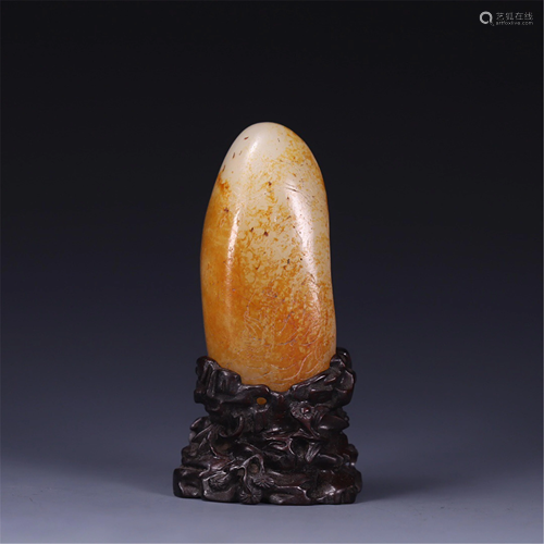 A CARVED JADE DECORATION