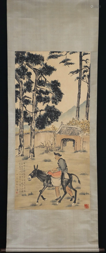 A CHINESE PAINTING OF WALKING WITH DONKEY