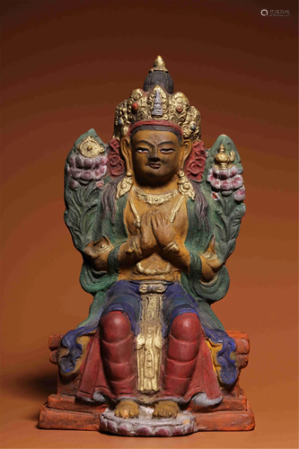 A POLYCHROME PAINTED CLAY BUDDHA STATUETTE