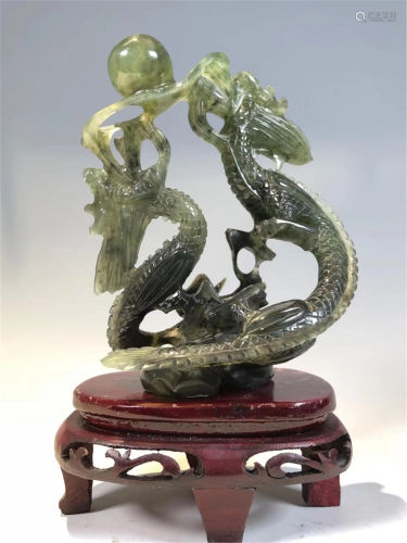 A JADE CARVED DOUBLE DRAGONS DECORATION