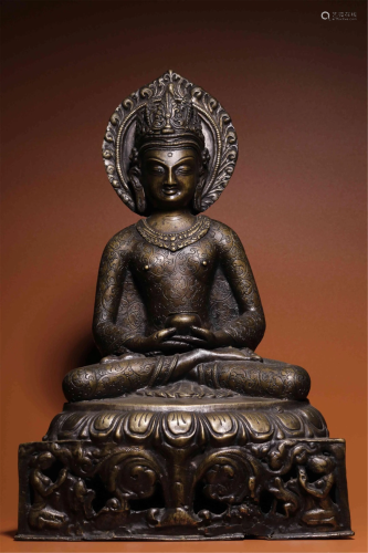 A BRONZE SEATED BUDDHA STATUETTE