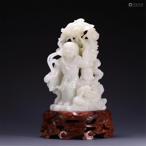 A JADE CARVED DECORATION OF TWO IMMORTALS