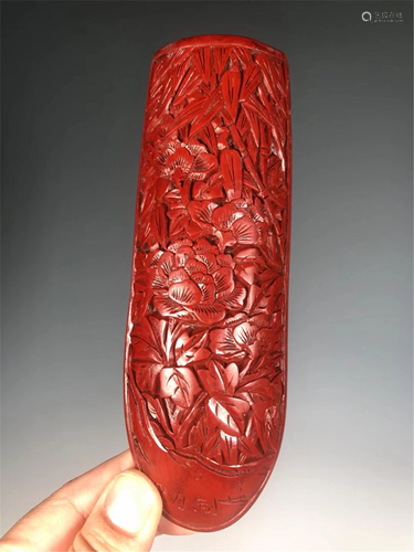 A CARVED RED LACQUER TEA TOOL