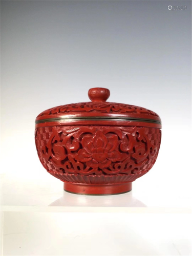 A CARVED RED LACQUER TEA-LEAF JAR AND COVER