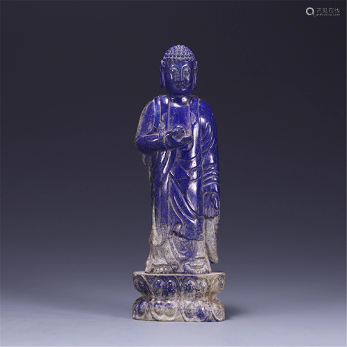 A LAPIS LAZULI CARVED STANDING SAKYAMUNI