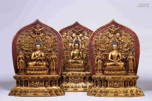 A GROUP OF THREE GILT BRONZE BUDDHA STATUETTES