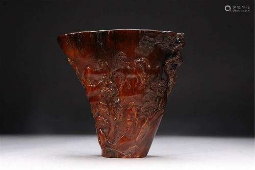 A GLASS CARVED FIGURES STORY CUP