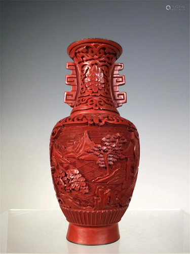 A CARVED RED LACQUER LANDSCAPE VASE