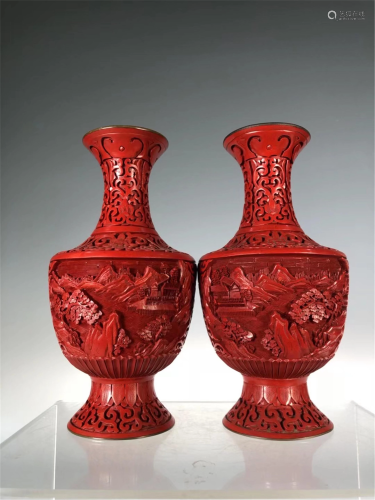 PAIR OF CARVED RED LACQUER LANDSCAPE VASES