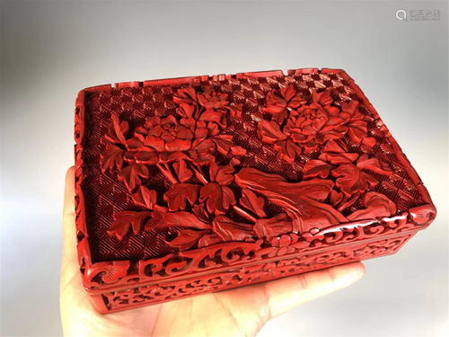 A CARVED RED LACQUER RECTANGULAR BOX AND COVER