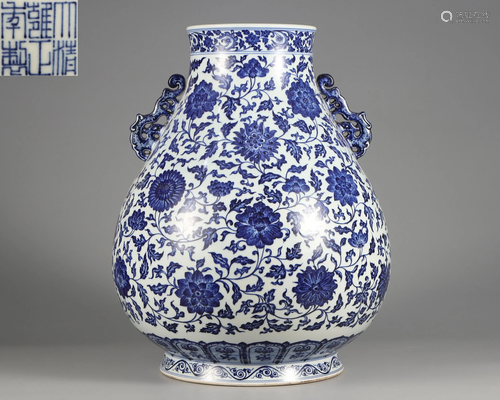 A Blue and White Lotus Scrolls Zun Vase Qing Dynasty