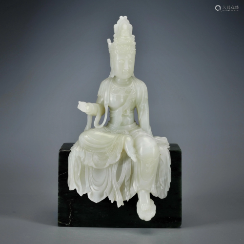 A Carved White Jade Seated Guanyin Qing Dynasty