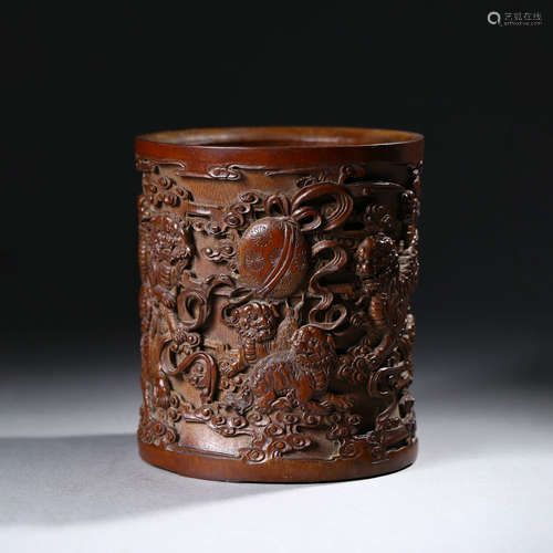 A Carved Bamboo Lion Brush Pot