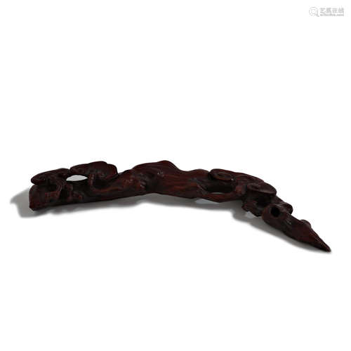 A Carved Rosewood Ruyi-Shaped Brush Rack