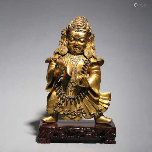 A Gilt Bronze Figure Of Guardian