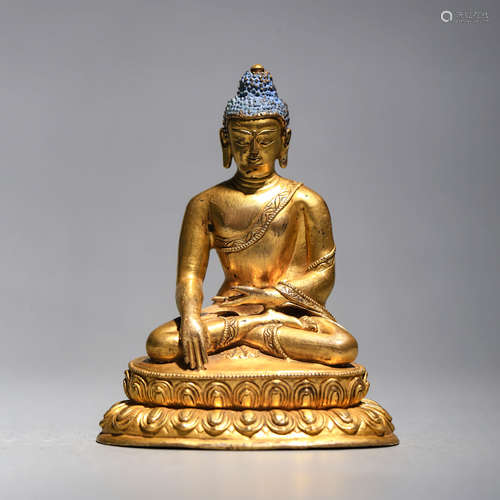 A Gilt Bronze Figure Of Shakyamuni