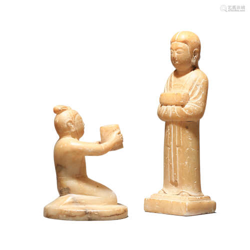 Two Carved Stone Figures