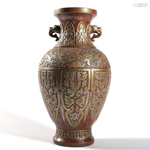 An Aubergine Glaze Incised Double-Eared Zun