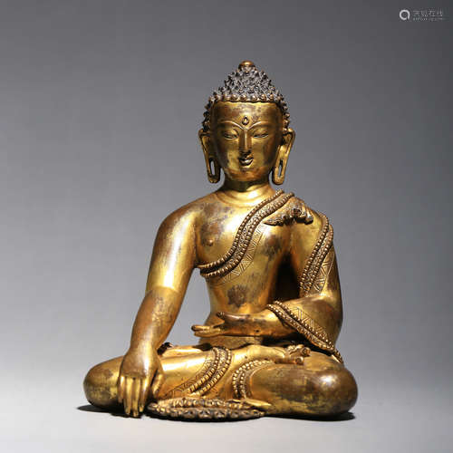 A Gilt Bronze Of Shakyamuni