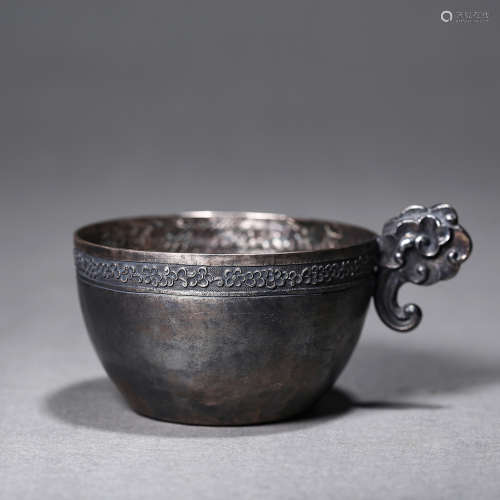 A Silver Cup With Handle