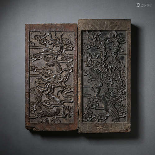 A PAIR OF BLUE BRICKS WITH DRAGON AND PHOENIX PATTERN, HAN D...