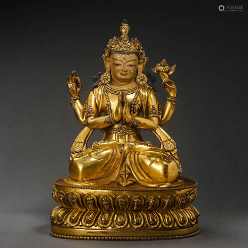 A GILT BRONZE FOUR-ARMED GUANYIN BUDDHA STATUE, THE YONGLILE...