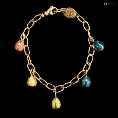Fabergé, bracelet à maille ovale retenant cinq œufs émaillés...
