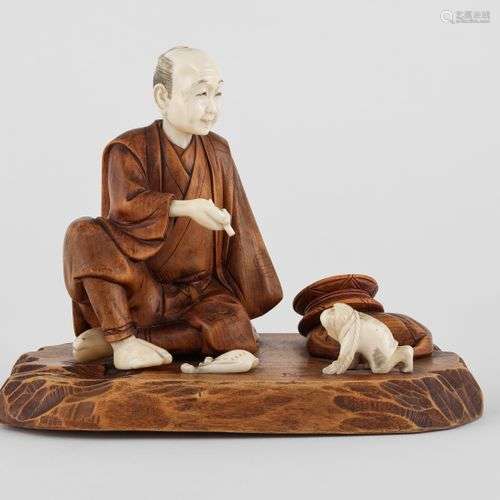 Okimono figurant un personnage au singe, Japon, fin XIXe s I...