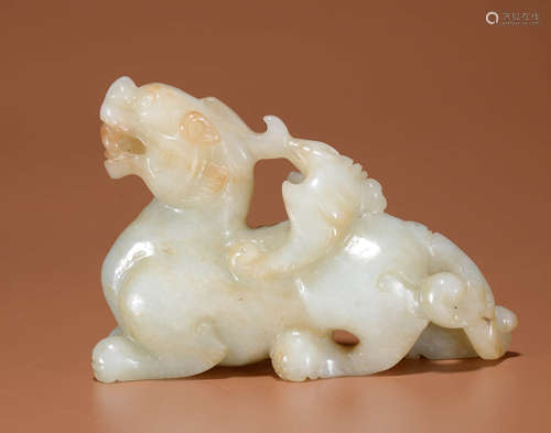 A HETIAN JADE CARVING OF MYTHICAL BEAST