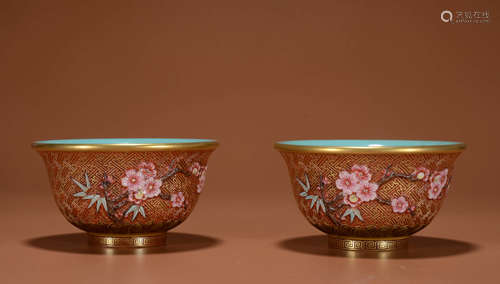 A PAIR OF CARVED PORCELAIN AND GILT DECO PLUM BLOSSOM CUPS