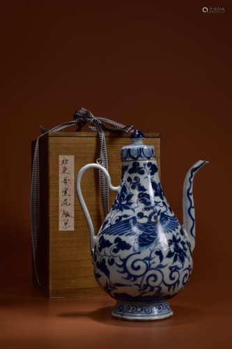 A BLUE AND WHITE PHOENIX EWER