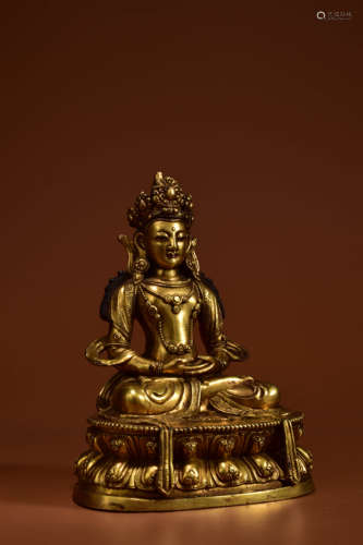 A GILT BRONZE STATUE OF AMITAYUS