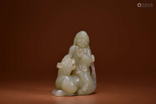A WHITE JADE CARVING OF ARHAT AND TIGER